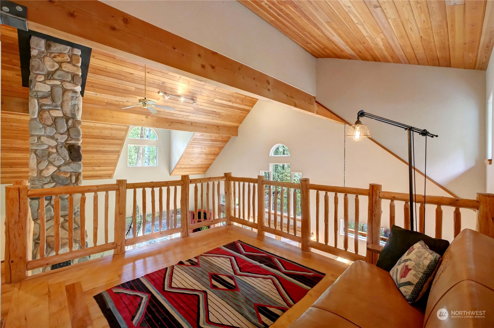 699 Lost River Road Mazama, WA 98833 - Photo 31 of 40 a balcony with wooden floor