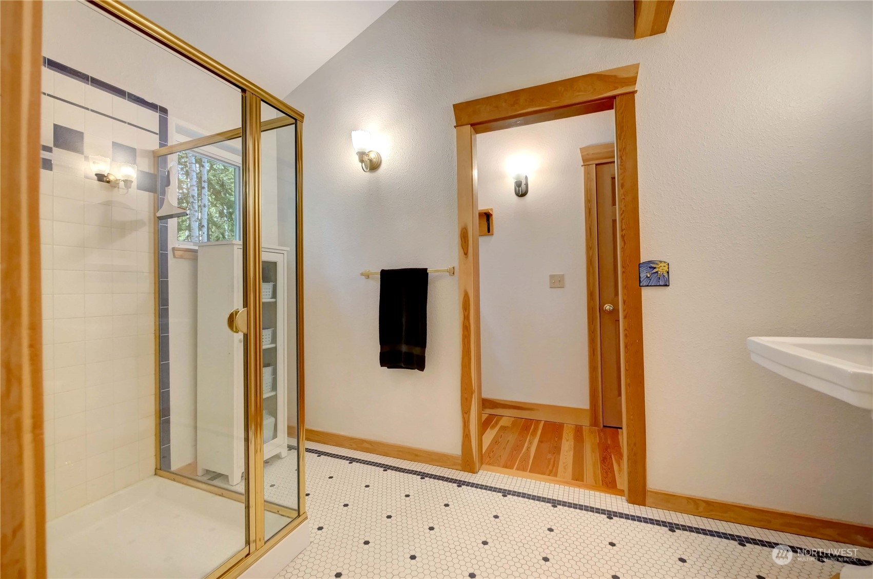 699 Lost River Road Mazama, WA 98833 - Photo 36 of 40 a bathroom with a shower and a mirror