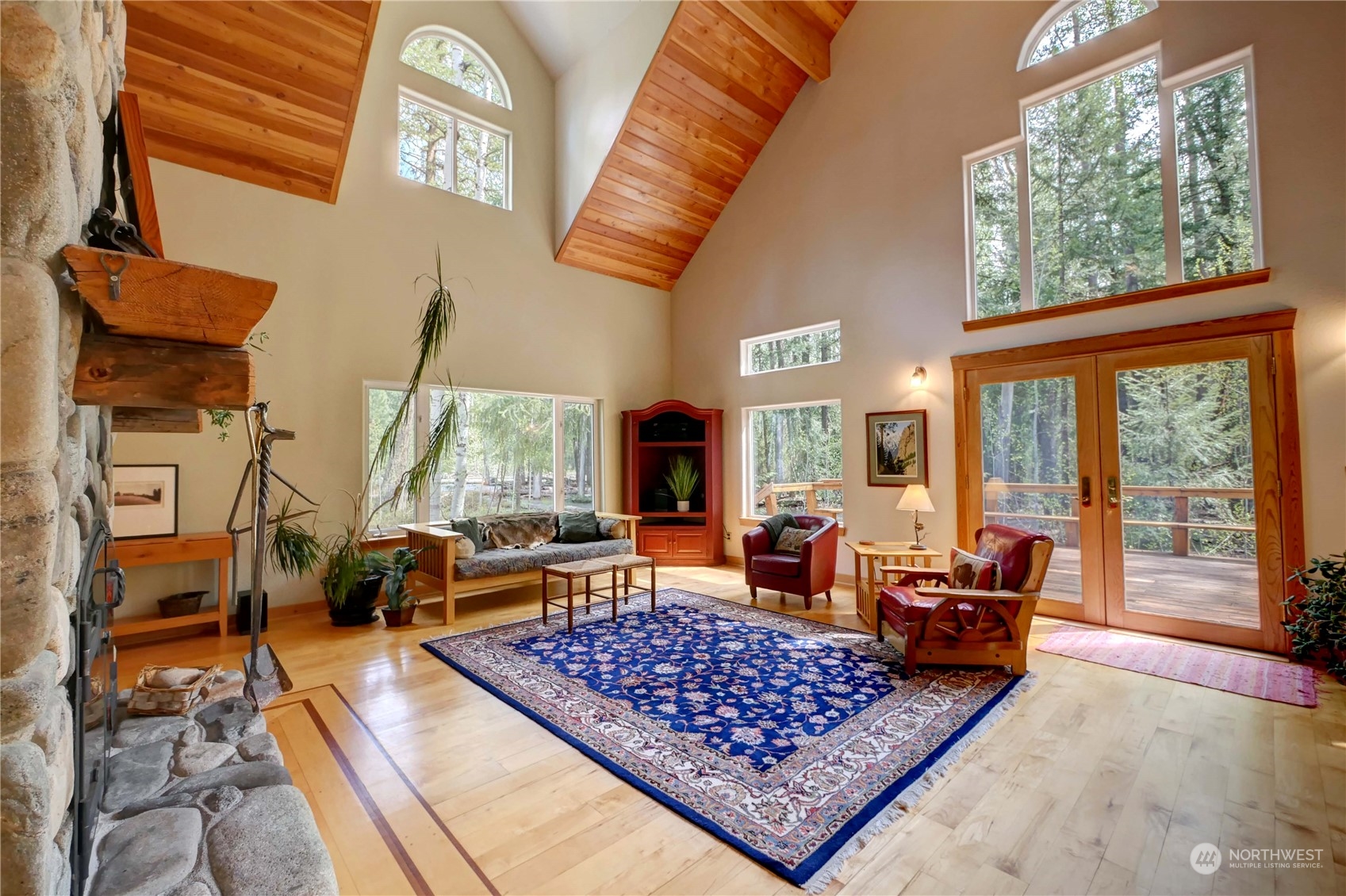 699 Lost River Road Mazama, WA 98833 - Photo 9 of 40 a living room with furniture large window with garden view