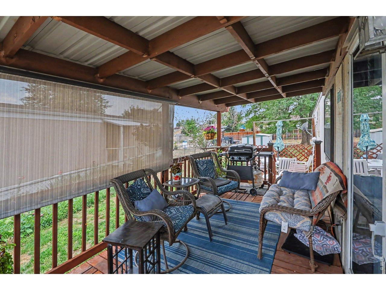 1401 9th Street, Unit 159 Fort Lupton, CO 80621 - Photo 13 of 24 Pergola that is great for enjoying your mornings and evenings! Lots of fun has been had here!