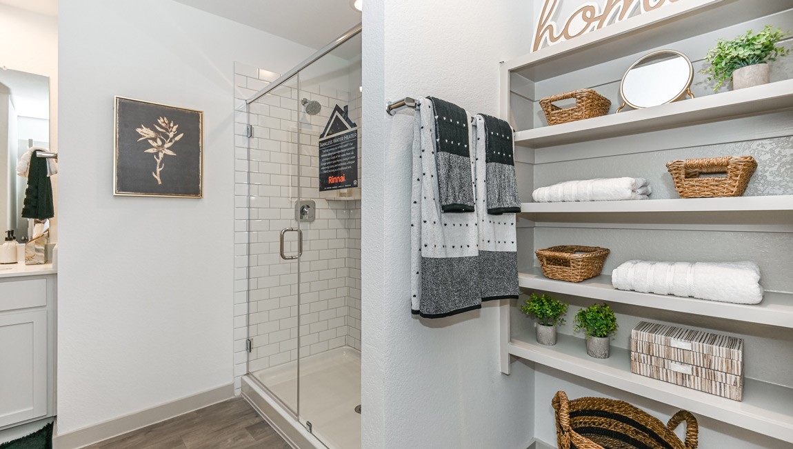 7918 Murciana Drive Rosharon, TX 77583 - Photo 15 of 21 a bathroom with a refrigerator and a sink