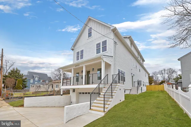 a living room with furniture and windows