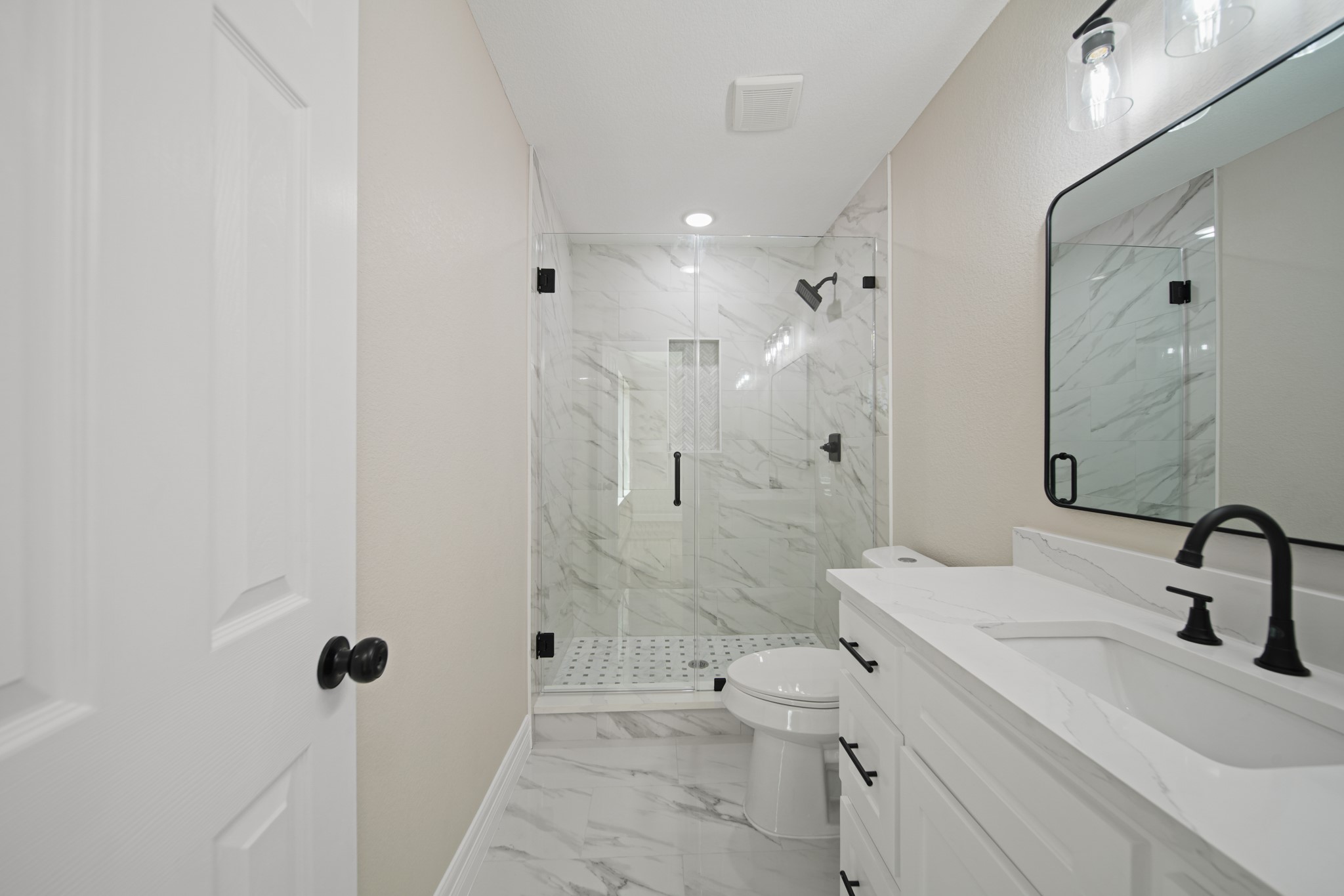 220 Pine Road Clear Lake Shores, TX 77565 - Photo 15 of 31 a bathroom with a sink a toilet and shower