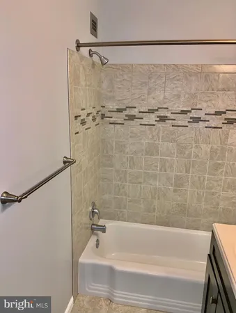 a kitchen with a table and chairs