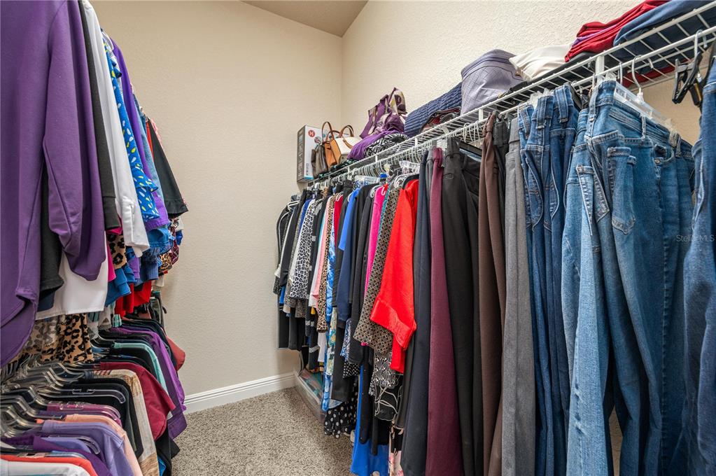 35 Stembridge Road Lake Wales, FL 33898 - Photo 27 of 61 a view of walk in closet with clothes