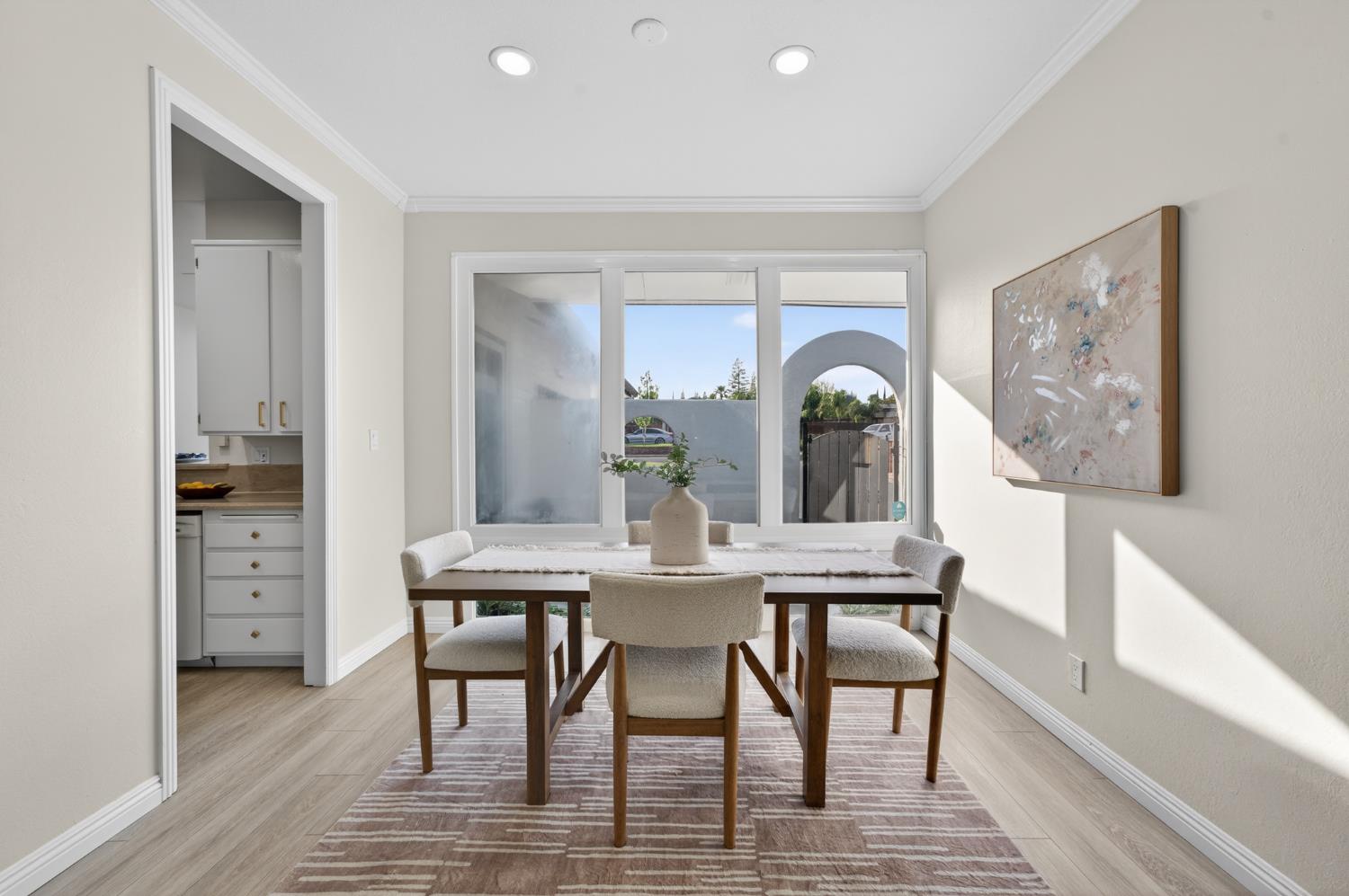 6035 Bryce Way Rocklin, CA 95677 - Photo 12 of 39 a view of a dining room with furniture and wooden floor