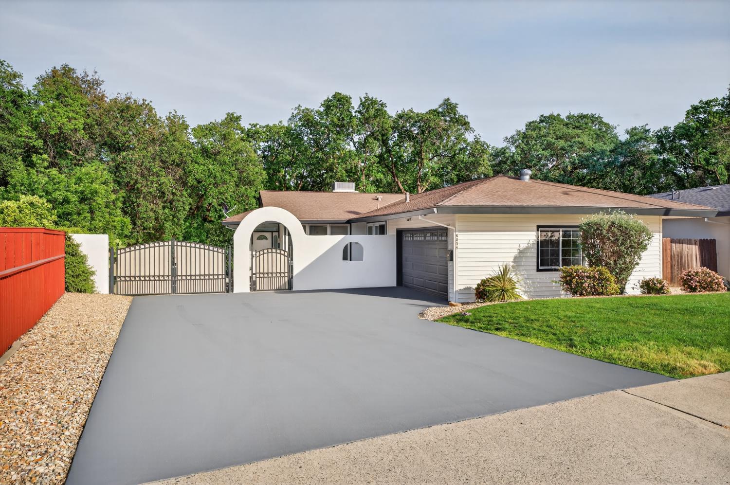 6035 Bryce Way Rocklin, CA 95677 - Photo 2 of 39 a front view of a house with a yard and garage