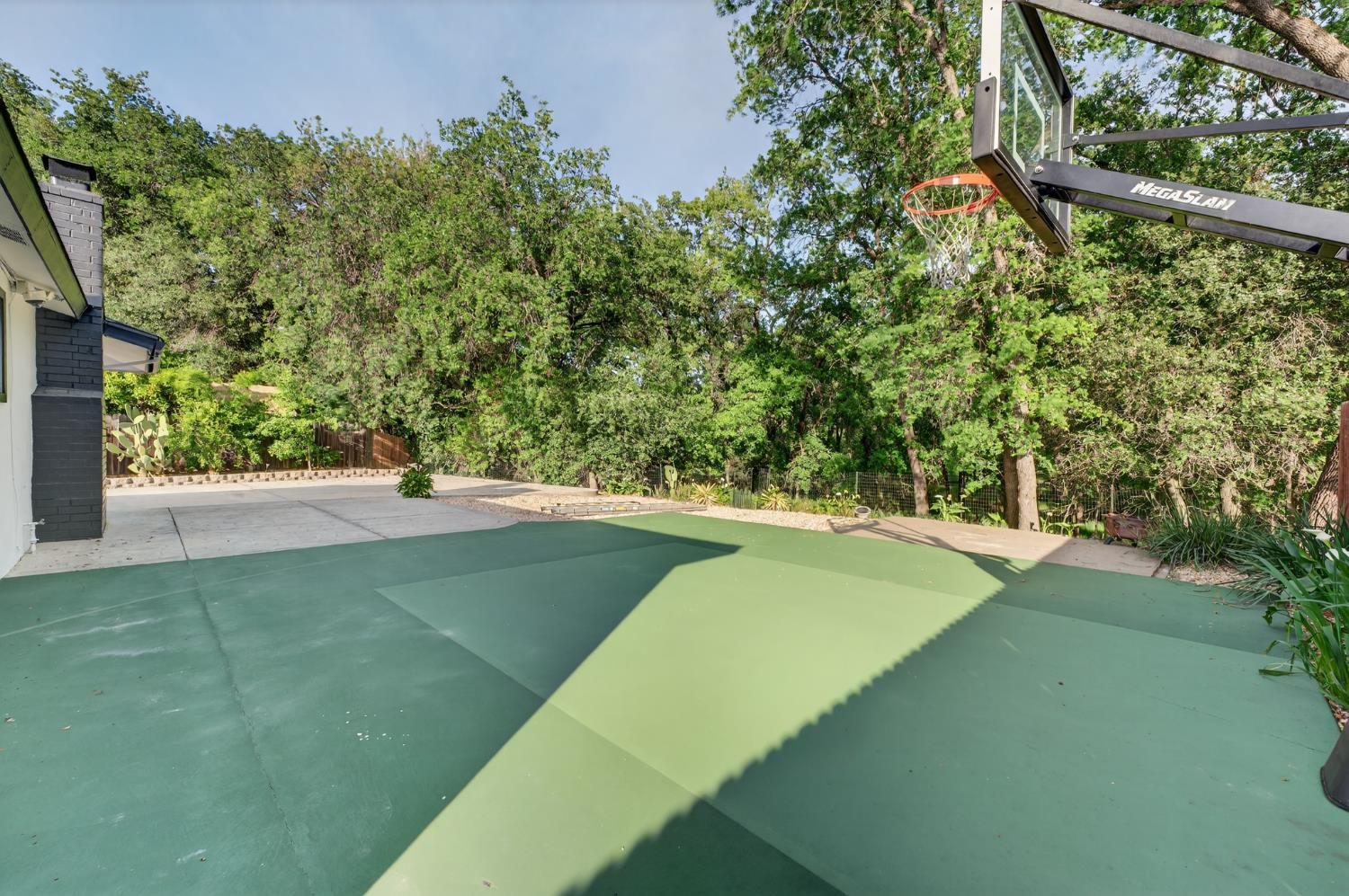 6035 Bryce Way Rocklin, CA 95677 - Photo 38 of 39 a view of a backyard with plants and a yard