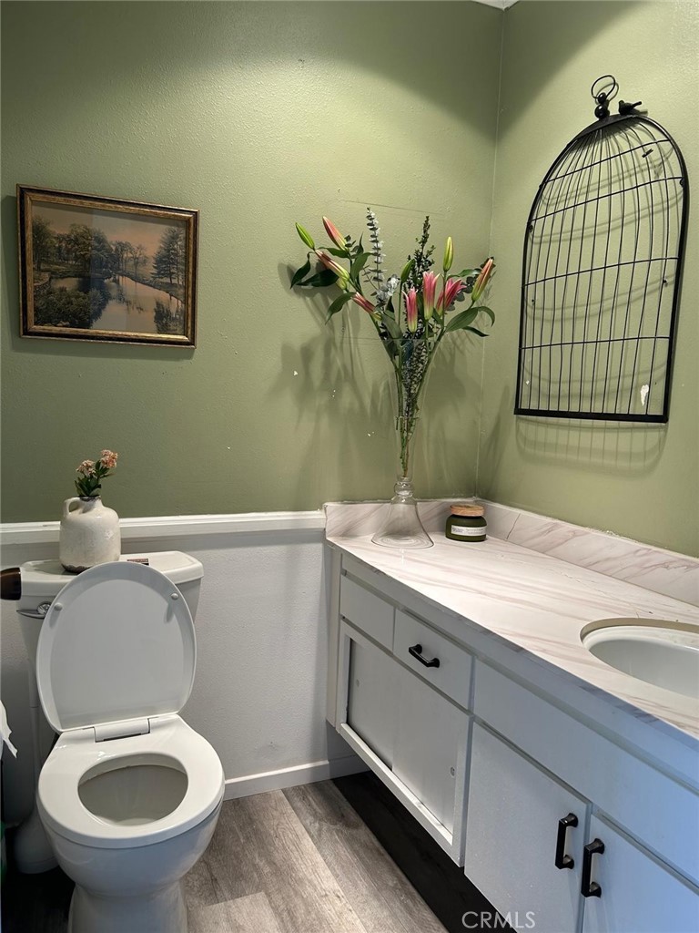 11231 Windemere Way Stanton, CA 90680 - Photo 4 of 16 half bath on first floor
