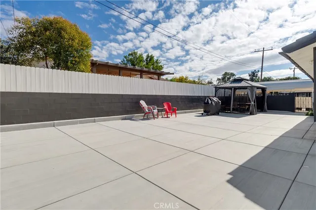 a view of outdoor space with lounge chair