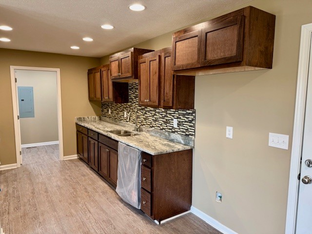 1427 Old Estill Springs Road Tullahoma, TN 37388 - Photo 12 of 44 a kitchen with stainless steel appliances granite countertop a stove and a refrigerator