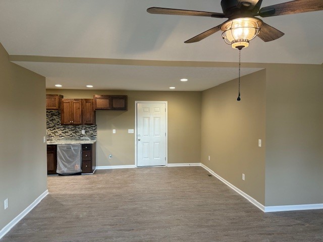 1427 Old Estill Springs Road Tullahoma, TN 37388 - Photo 16 of 44 a view of an empty room with a kitchen