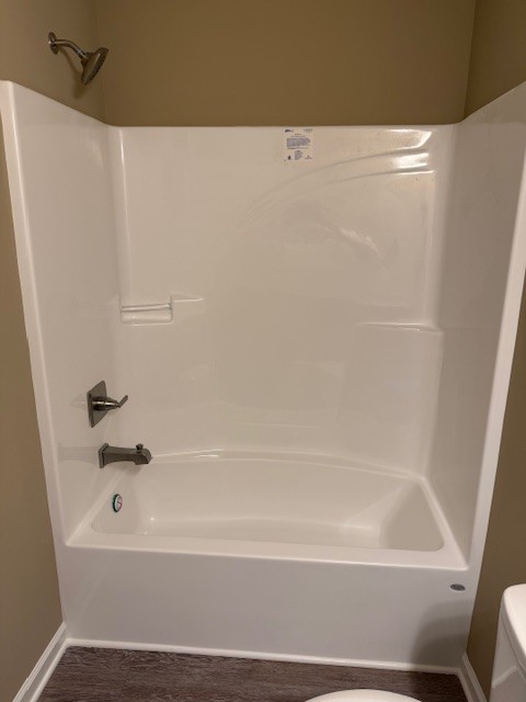 1427 Old Estill Springs Road Tullahoma, TN 37388 - Photo 26 of 44 a bathroom with a bathtub