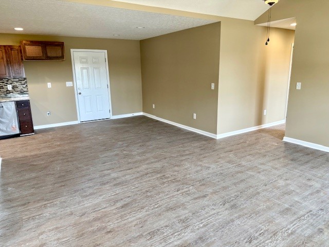 1427 Old Estill Springs Road Tullahoma, TN 37388 - Photo 32 of 44 a view of an empty room with a fireplace