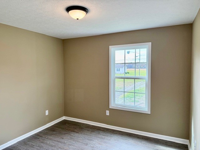 1427 Old Estill Springs Road Tullahoma, TN 37388 - Photo 38 of 44 an empty room with a window