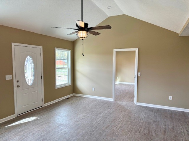 1427 Old Estill Springs Road Tullahoma, TN 37388 - Photo 5 of 44 an empty room with windows and fan