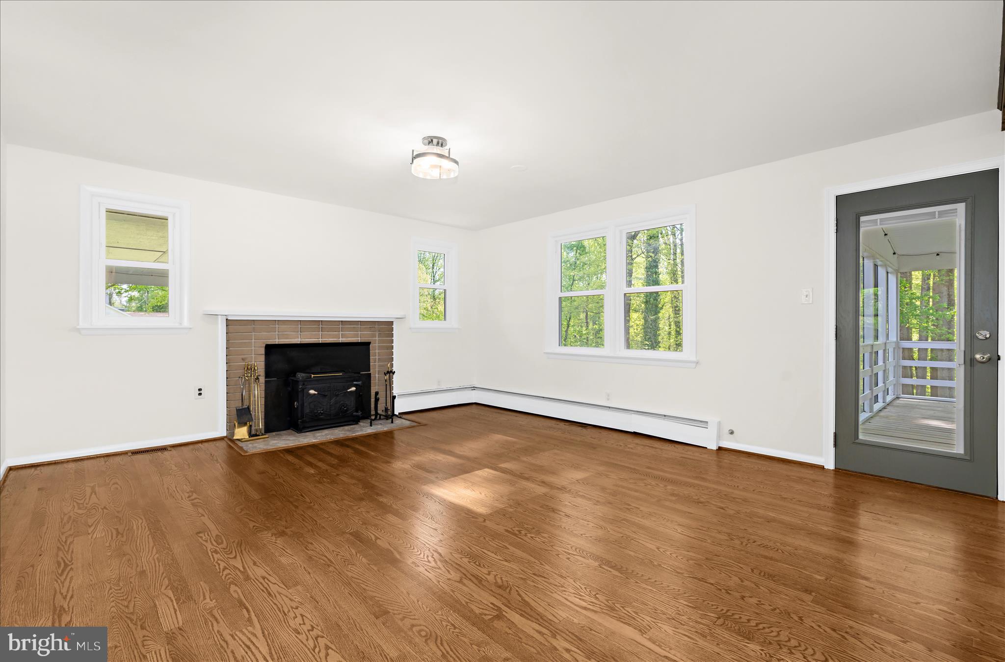 2836 Ridge Road Windsor Mill, MD 21244 - Photo 12 of 47 Dining room steps onto the screen porch
