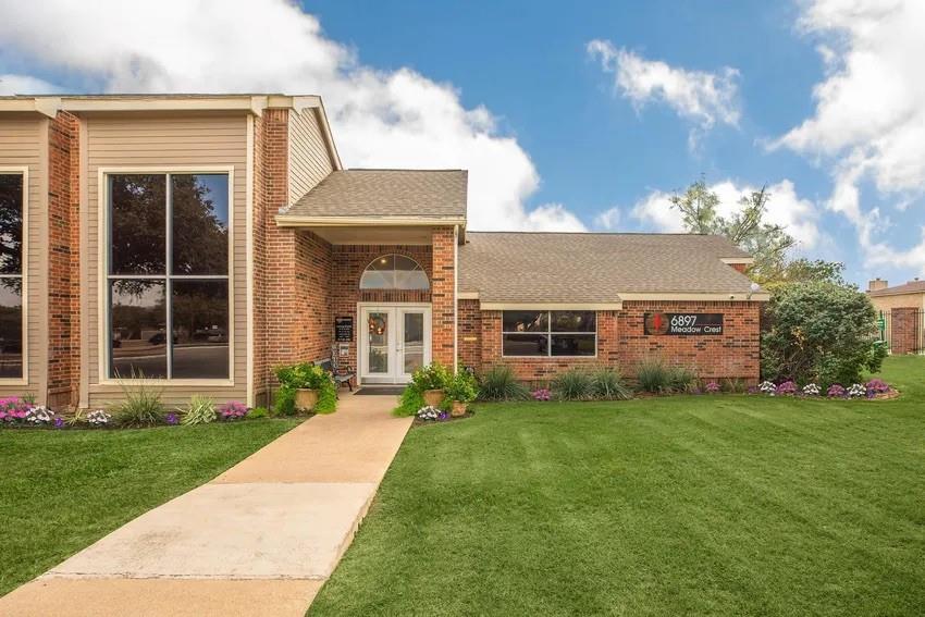 6897 Meadow Road North Richland Hills, TX 76182 - Photo 1 of 13 front view of a house with a yard