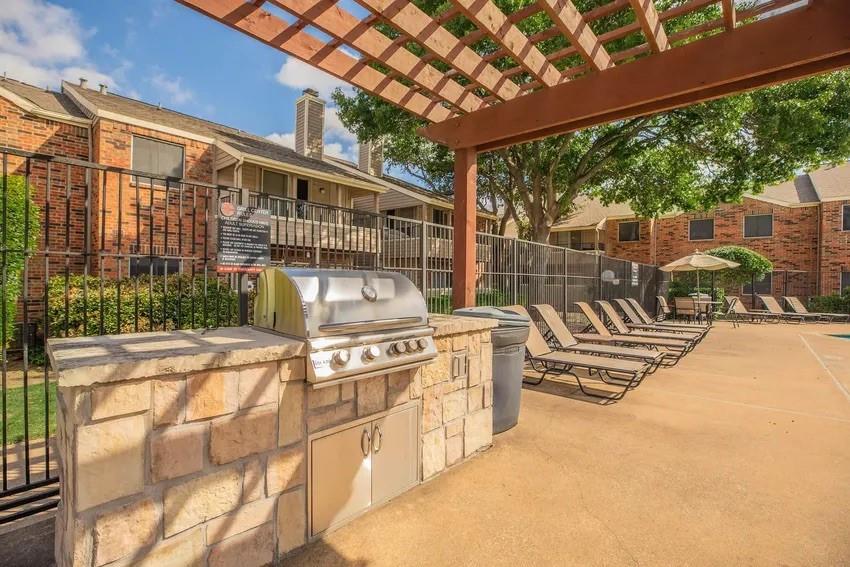 6897 Meadow Road North Richland Hills, TX 76182 - Photo 11 of 13 a view of a patio with a table and chairs and potted plants