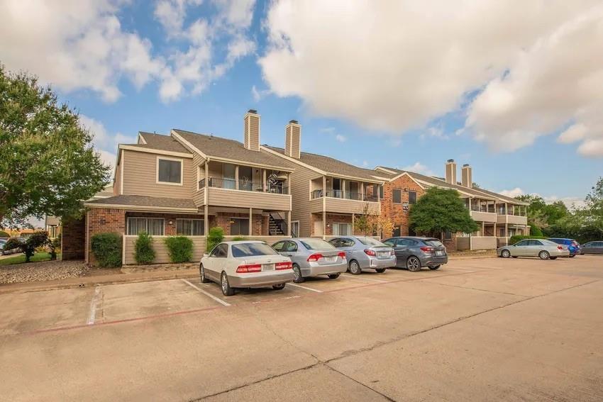 6897 Meadow Road North Richland Hills, TX 76182 - Photo 10 of 13 a car parked in front of a building
