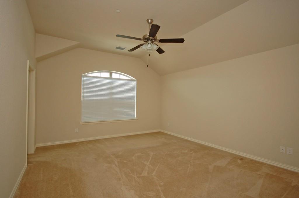 6604 Rutherford Road Plano, TX 75023 - Photo 9 of 12 an empty room with a window