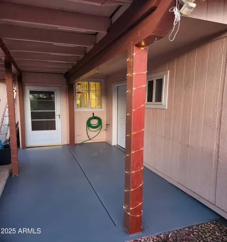 a view of a livingroom with wooden floor