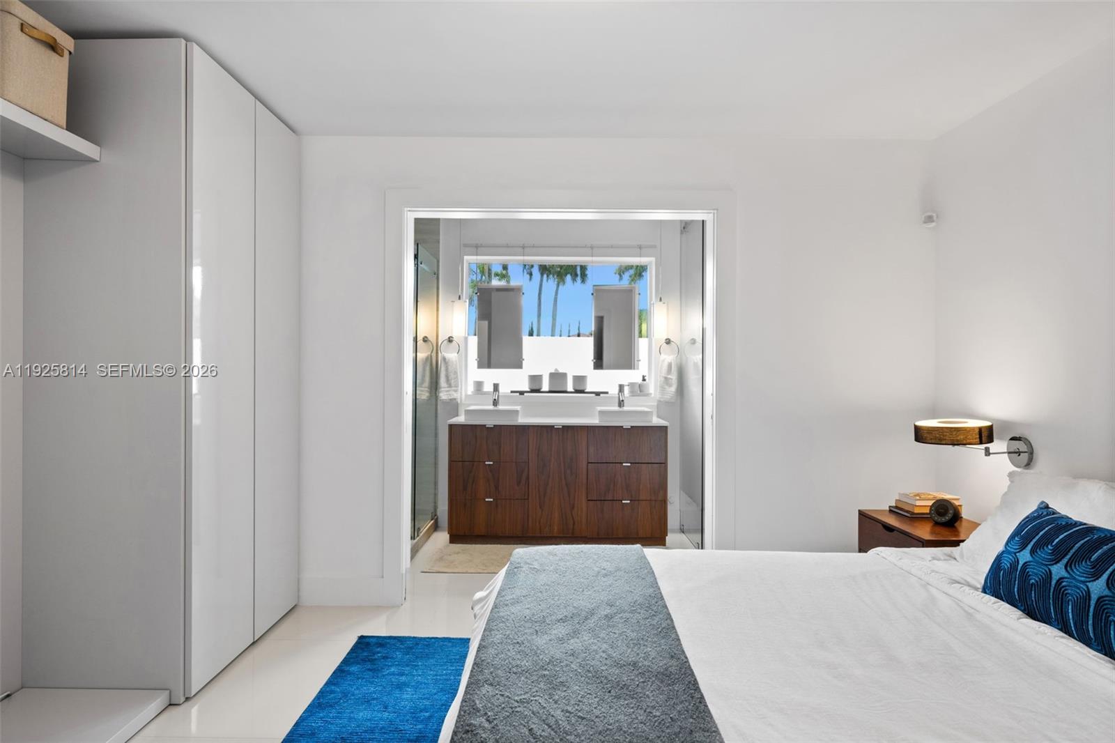 45 Southwest 19th Road Miami, FL 33129 - Photo 24 of 56 a bedroom with a bed and a dresser