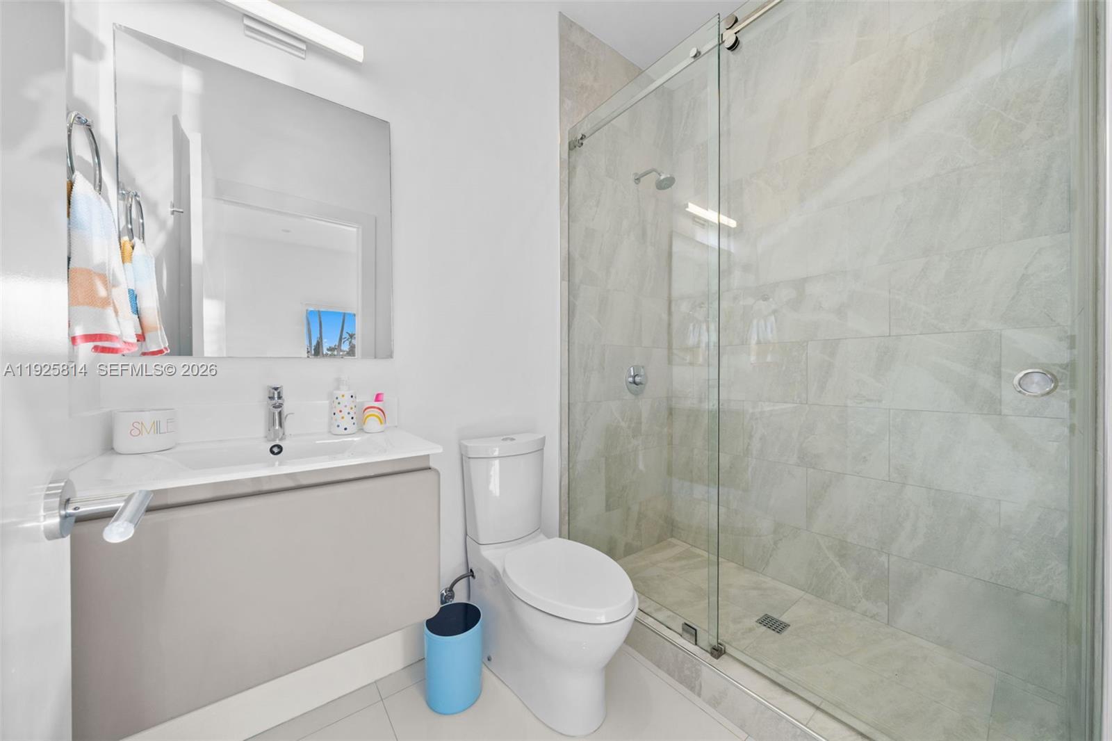 45 Southwest 19th Road Miami, FL 33129 - Photo 44 of 56 a bathroom with a sink toilet and shower