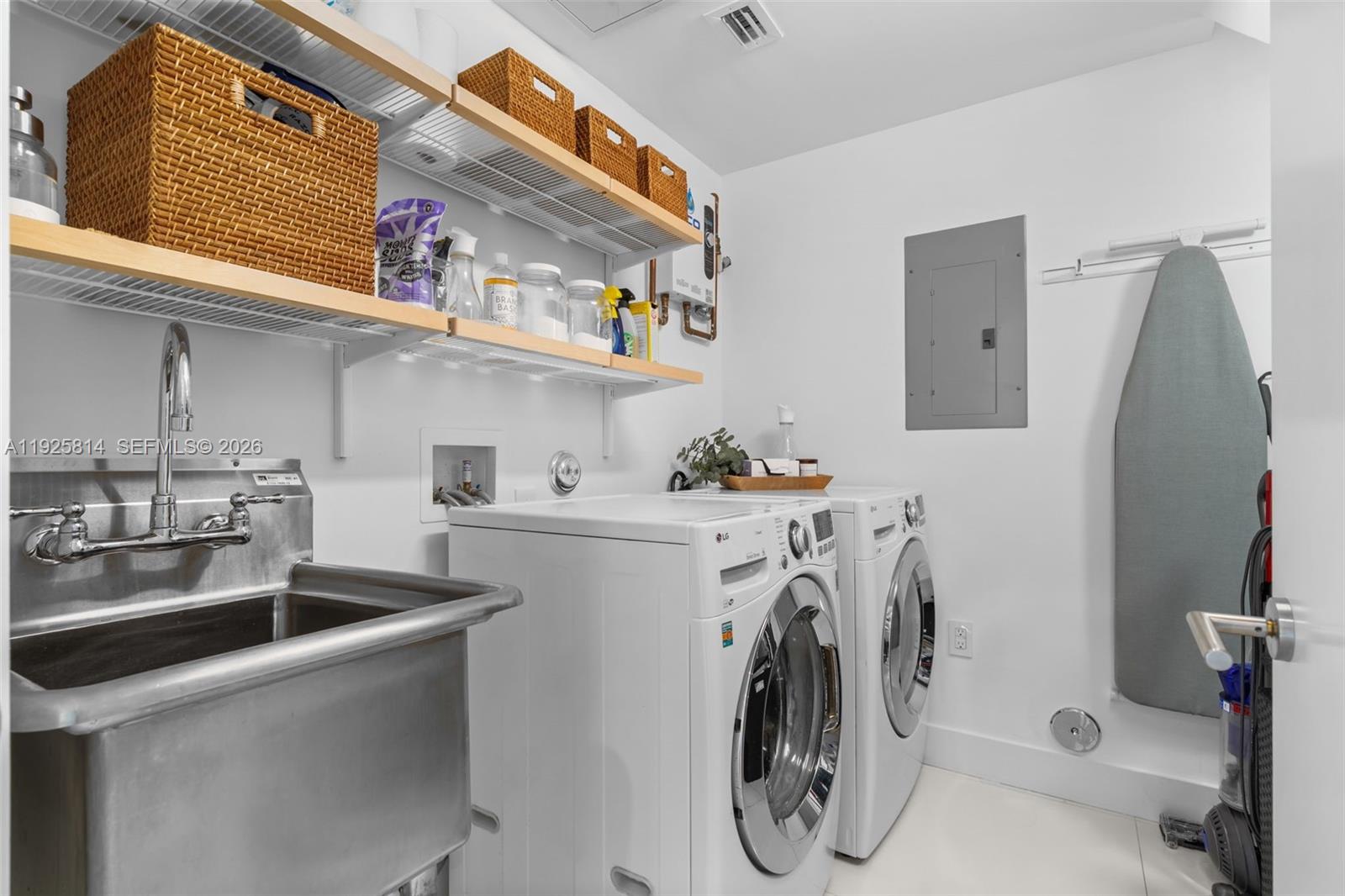 45 Southwest 19th Road Miami, FL 33129 - Photo 45 of 56 a utility room with dryer and washer