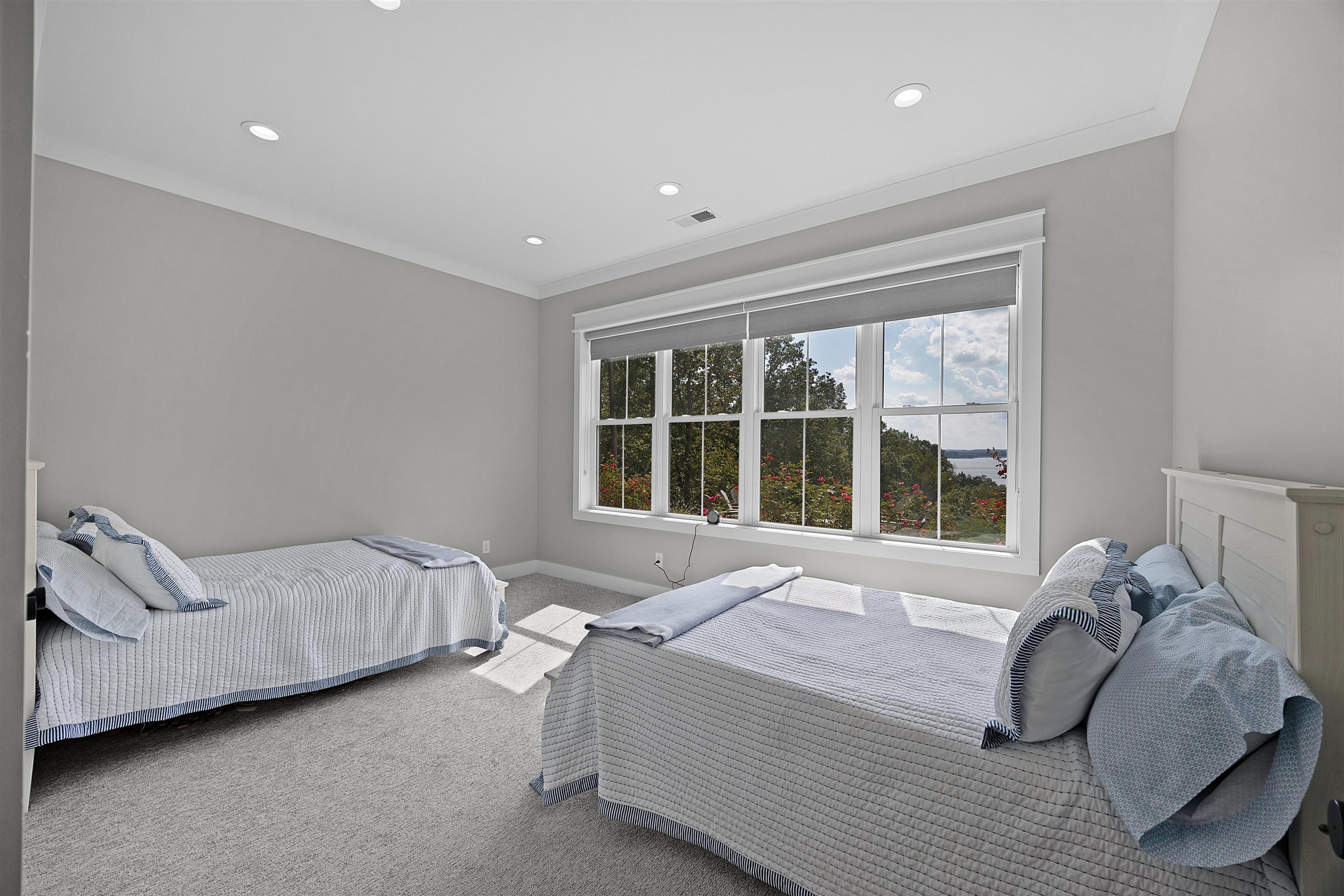 15 Daylight Cove Savannah, TN 38372 - Photo 18 of 37 a bedroom with a bed and window