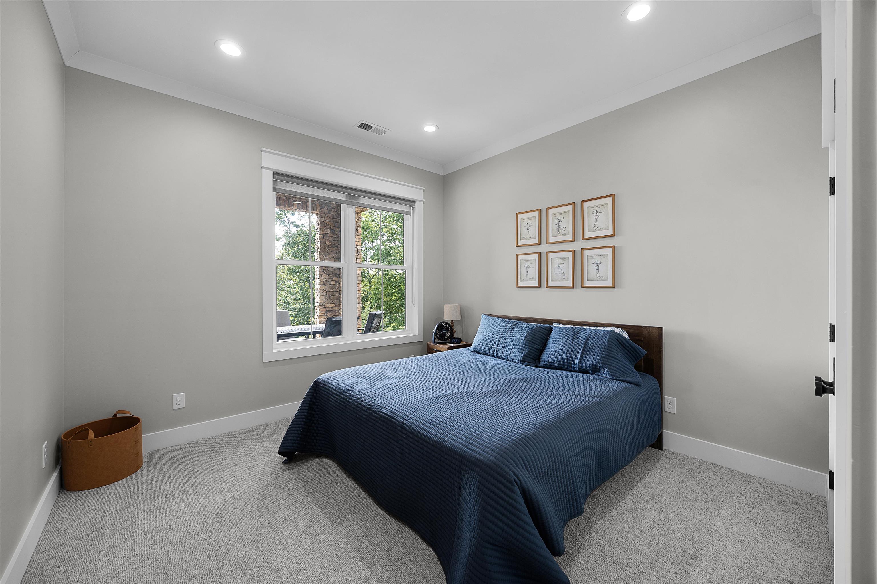 15 Daylight Cove Savannah, TN 38372 - Photo 21 of 37 a bedroom with a bed and a window
