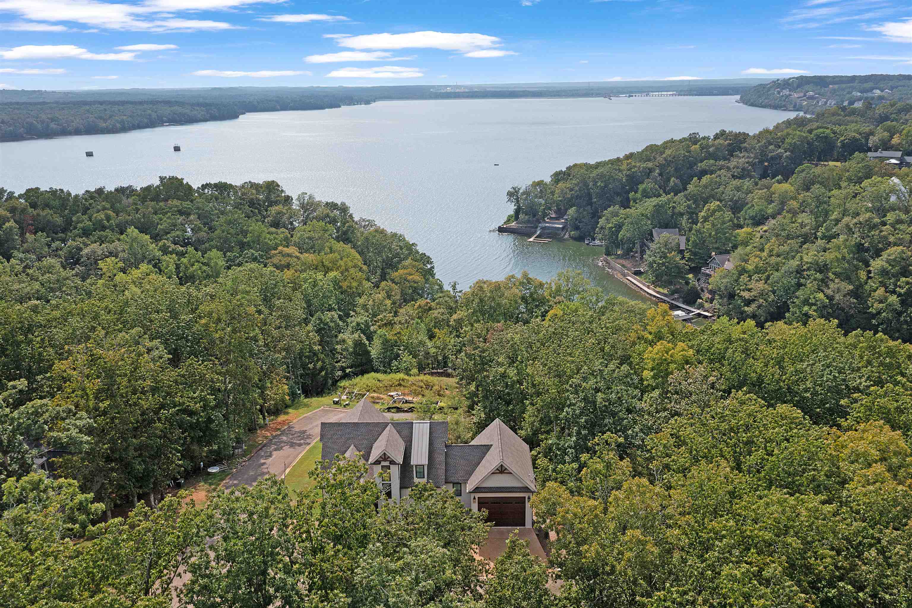 15 Daylight Cove Savannah, TN 38372 - Photo 29 of 37 an aerial view of a house with a yard and lake view