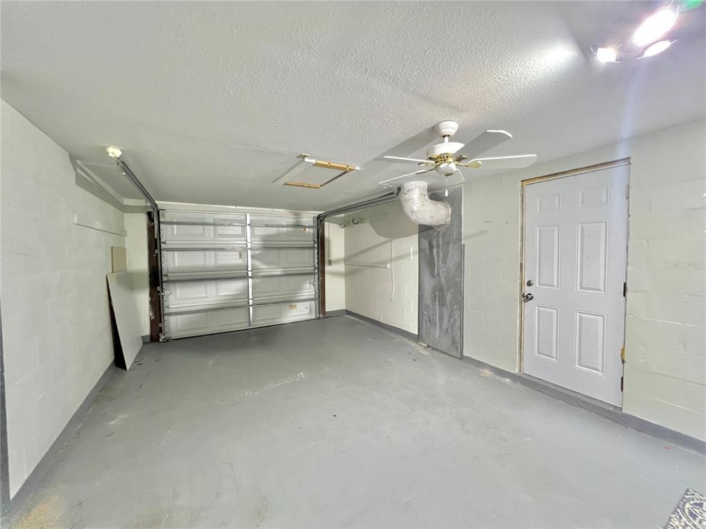 12206 Quail Run Row Hudson, FL 34667 - Photo 19 of 20 a view of a room with cabinet and mirrors