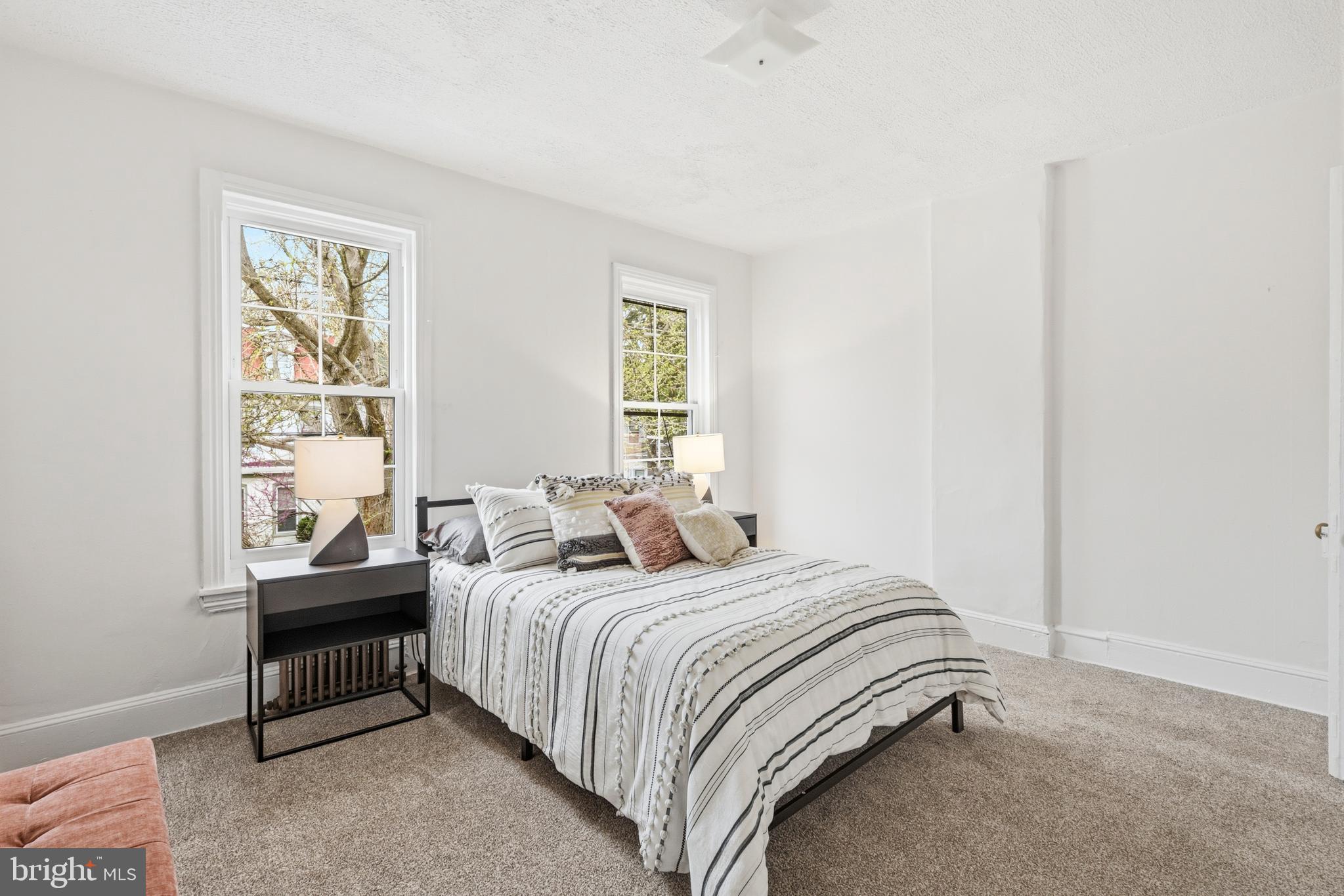 116 West Duval Street Philadelphia, PA 19144 - Photo 19 of 28 a bedroom with a bed and a window