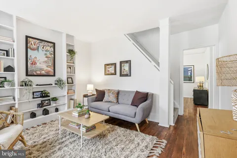 a living room with furniture and a couch