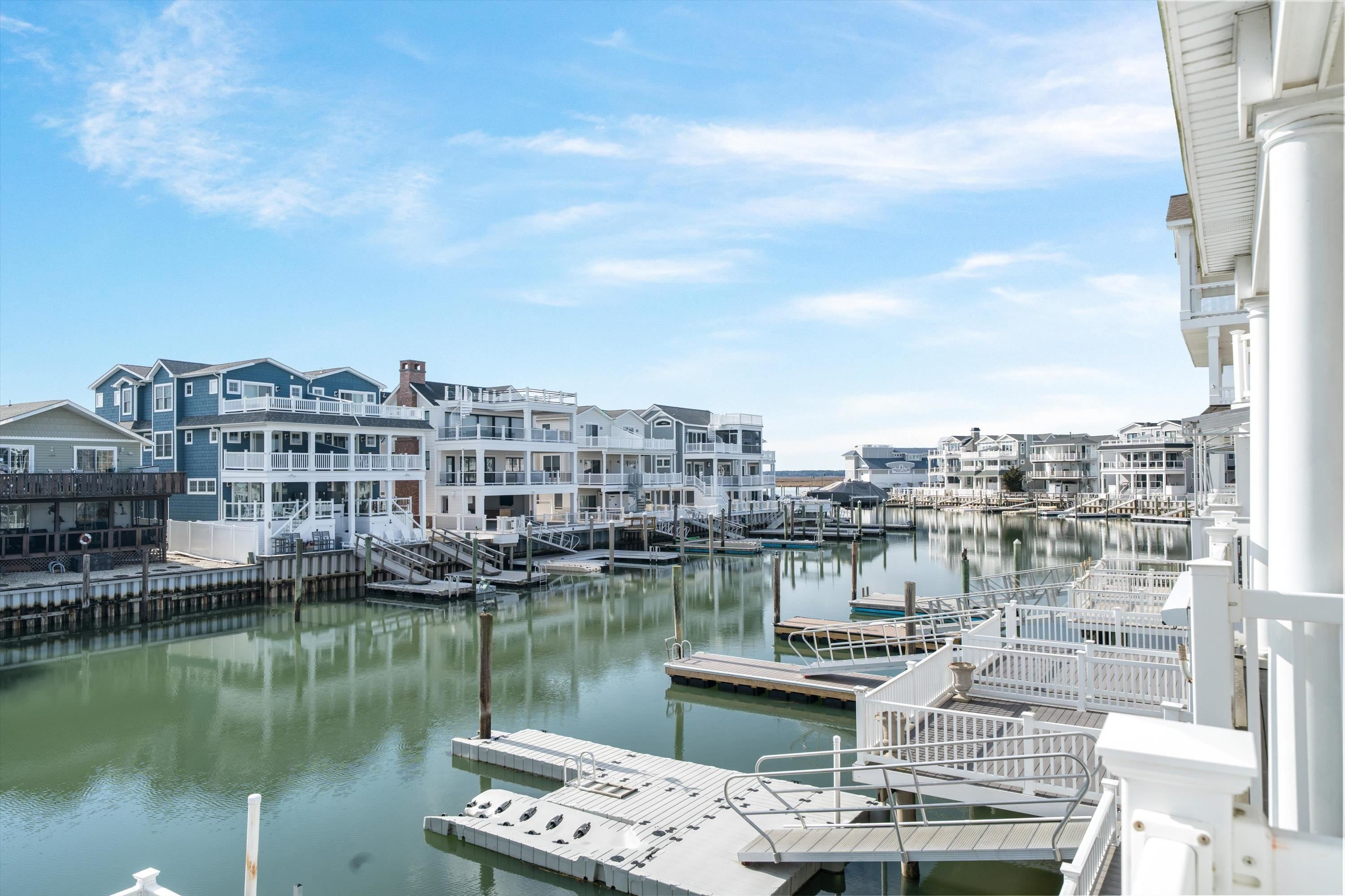 352 46th Place, Unit EAST Sea Isle City, NJ 08243 - Photo 21 of 40 a view of a lake with a city