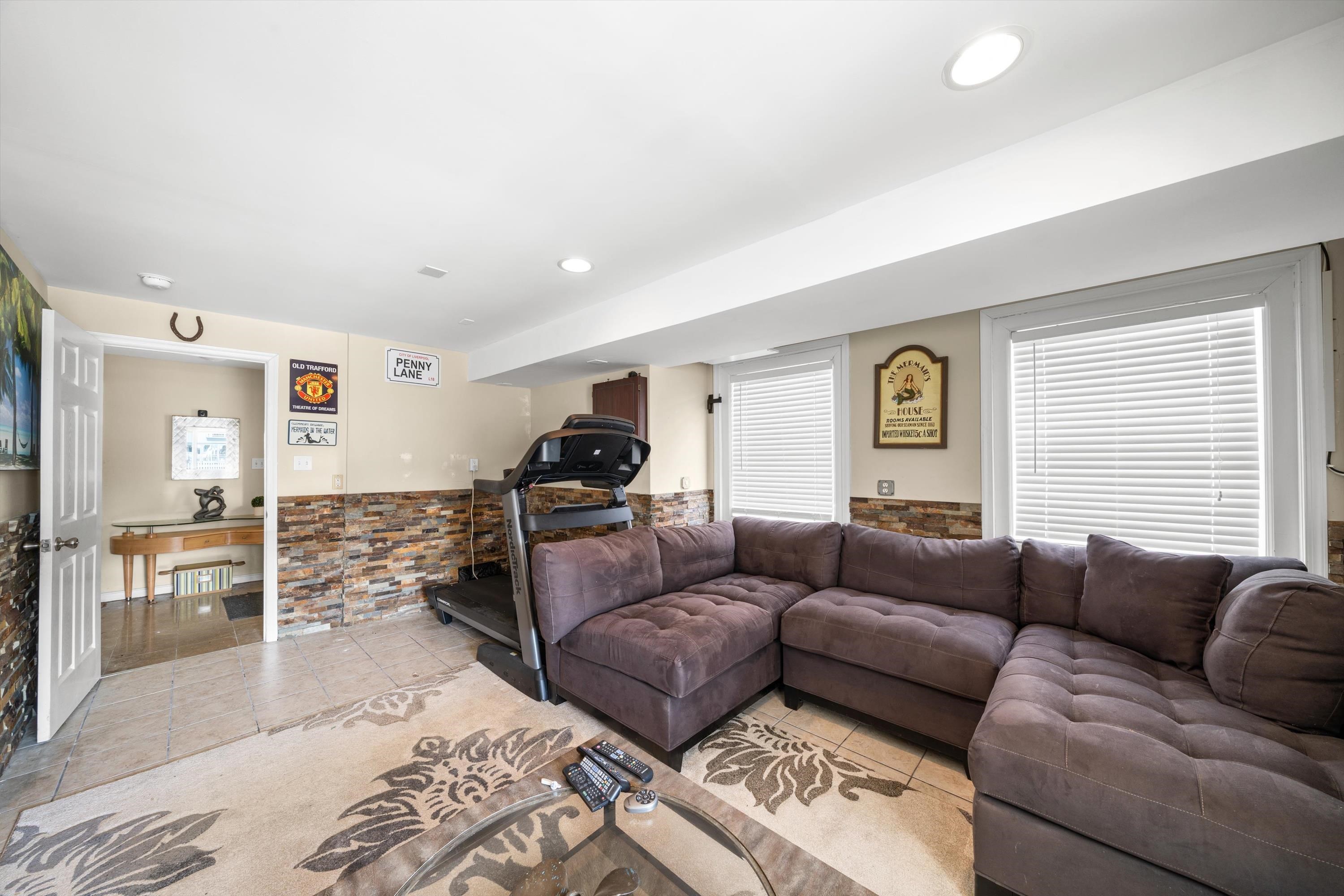 352 46th Place, Unit EAST Sea Isle City, NJ 08243 - Photo 9 of 40 a living room with furniture window and wooden floor