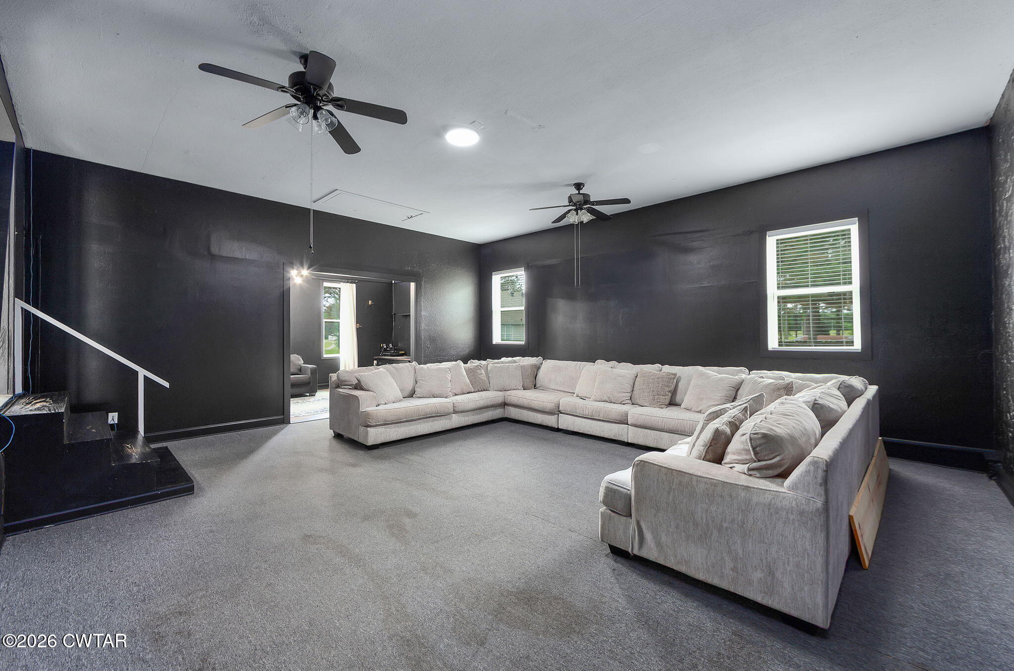 815 Trice Road Henderson, TN 38340 - Photo 12 of 34 a living room with furniture and a ceiling fan