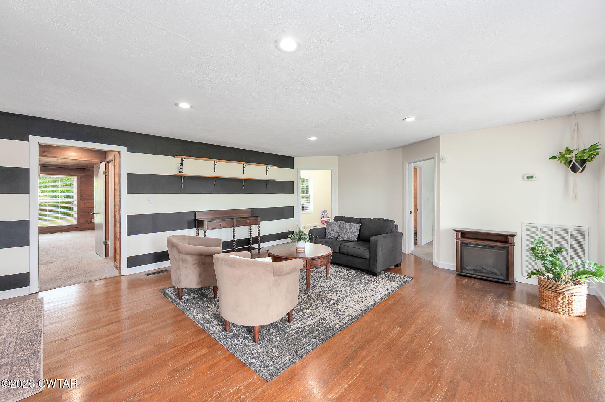 815 Trice Road Henderson, TN 38340 - Photo 2 of 34 a living room with furniture and a large window