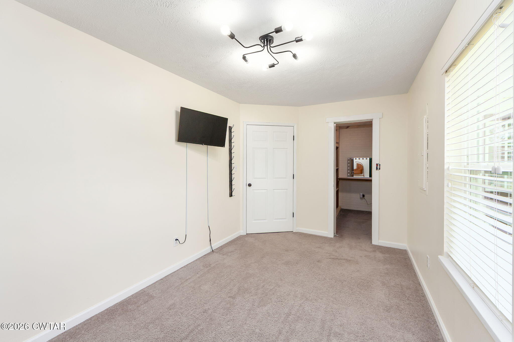 815 Trice Road Henderson, TN 38340 - Photo 26 of 34 a view of an empty room with a window
