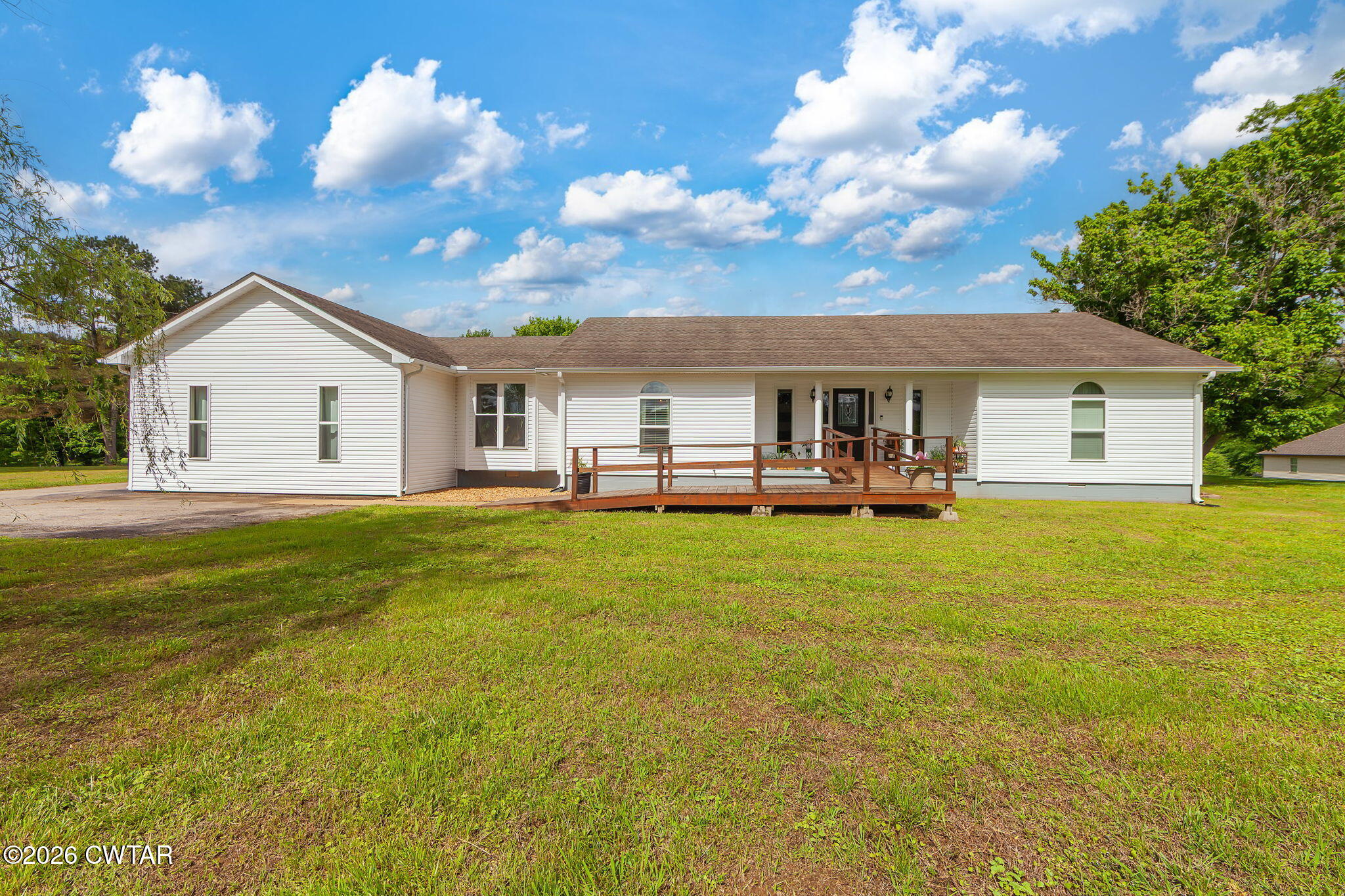 815 Trice Road Henderson, TN 38340 - Photo 34 of 34 a view of a house with a backyard porch and sitting area
