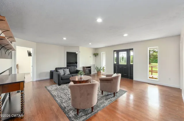 a kitchen with a stove a sink and a microwave