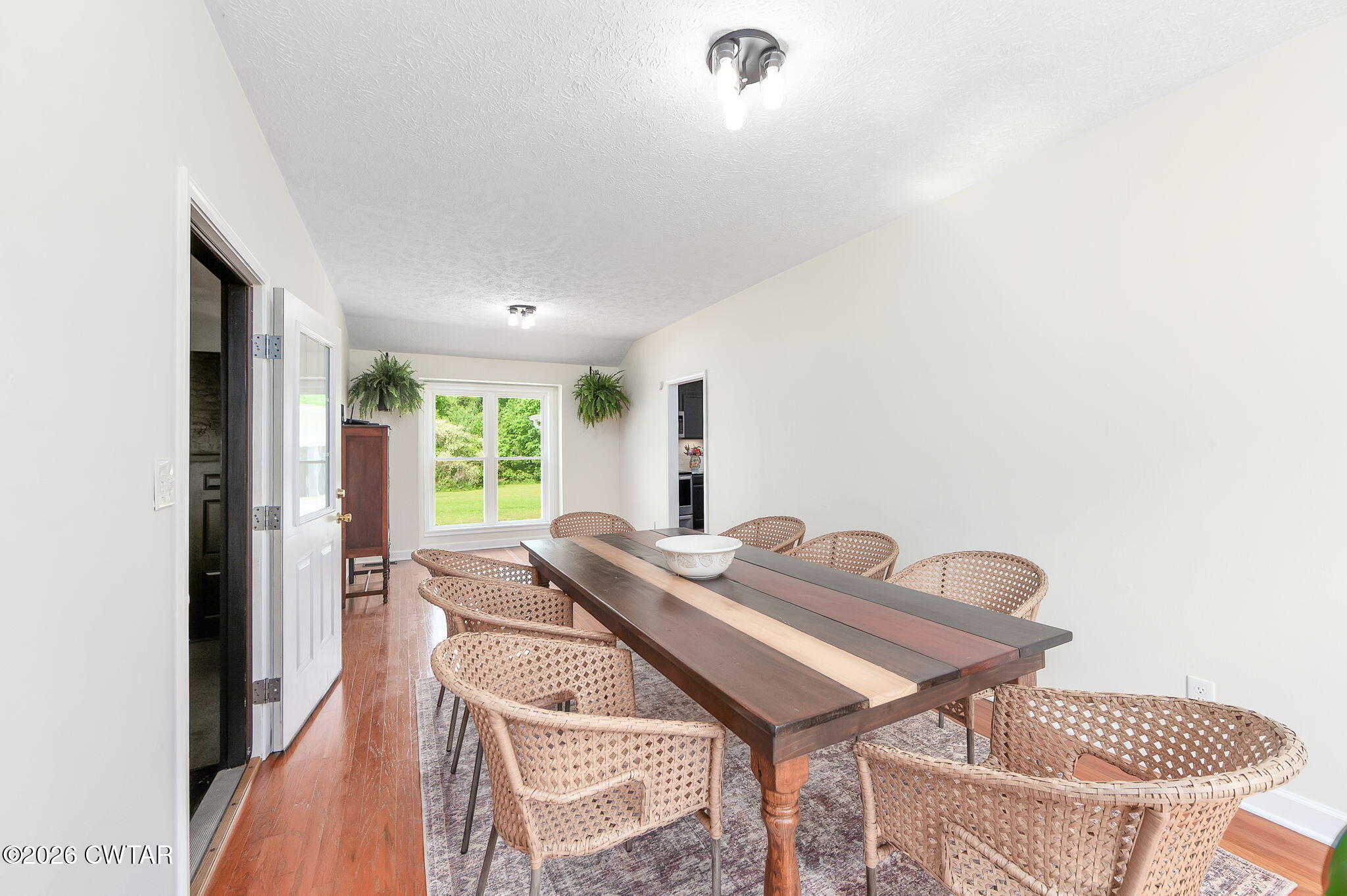 815 Trice Road Henderson, TN 38340 - Photo 10 of 34 a view of a dining room with furniture and a window