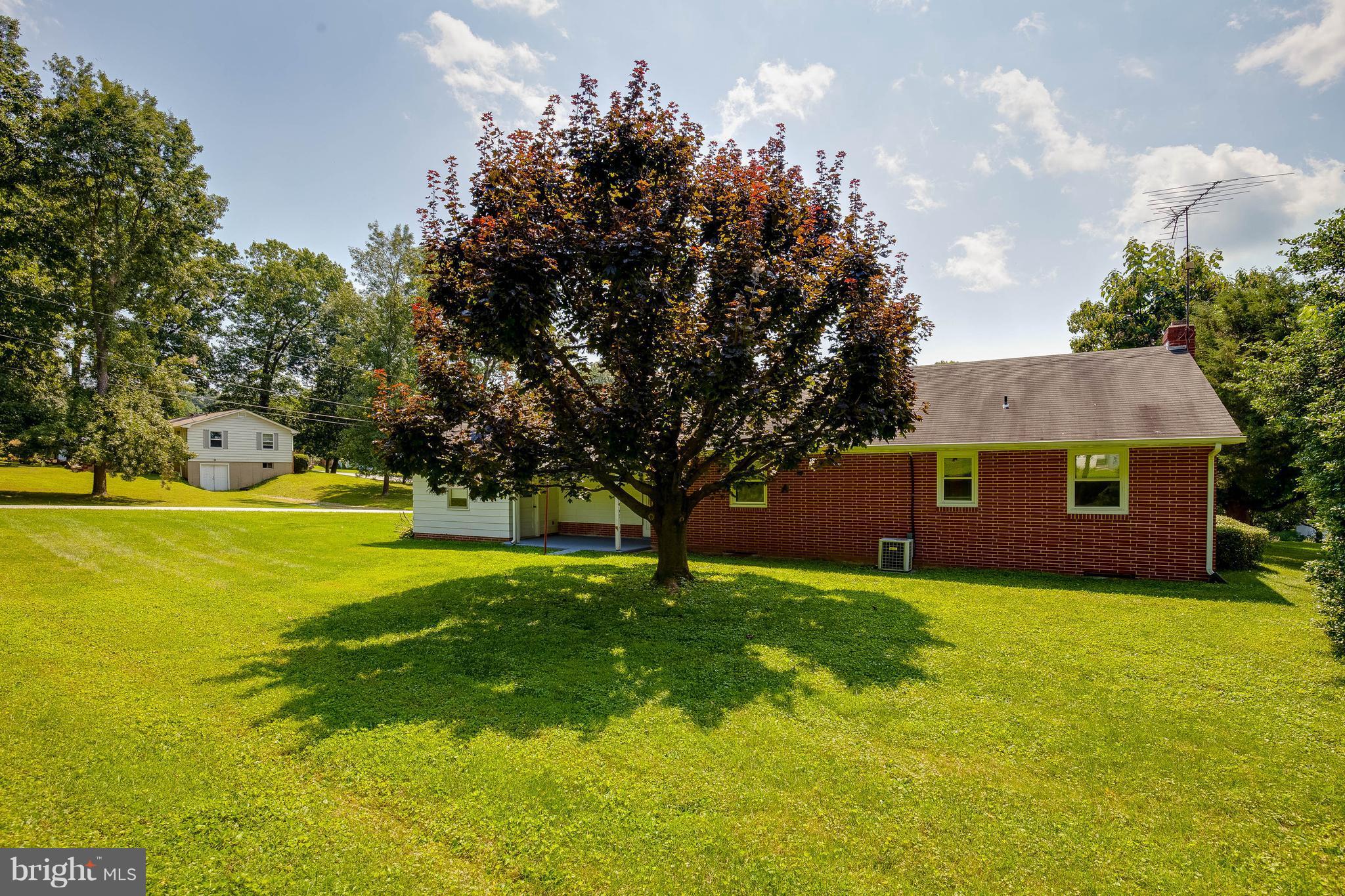 3430 Hampstead Mexico Road Hampstead, MD 21074 - Photo 3 of 28 Put your picnic table under this big tree.