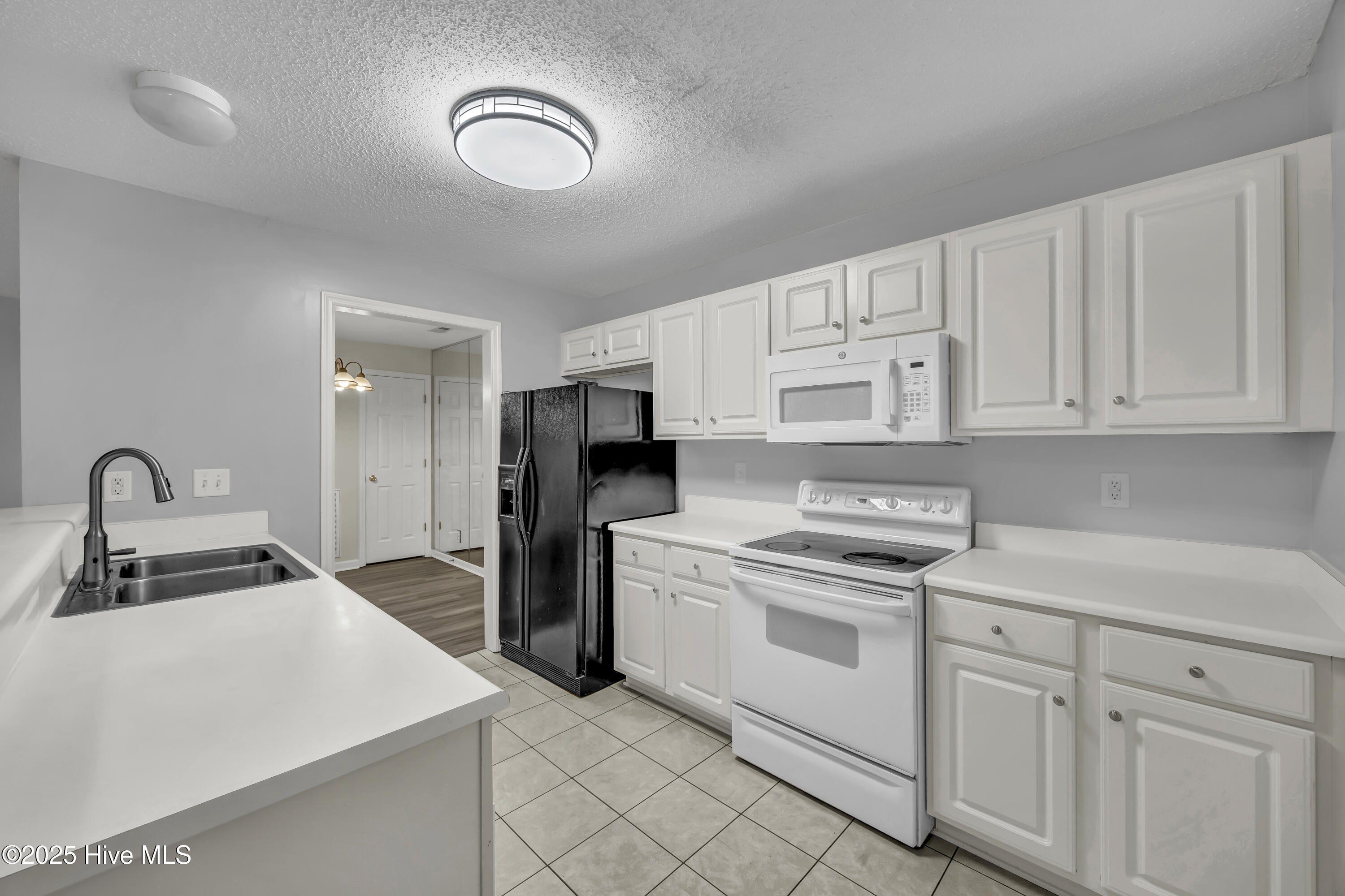 5012 Hunters Trail, Unit 7 Wilmington, NC 28405 - Photo 8 of 32 IMG_7230