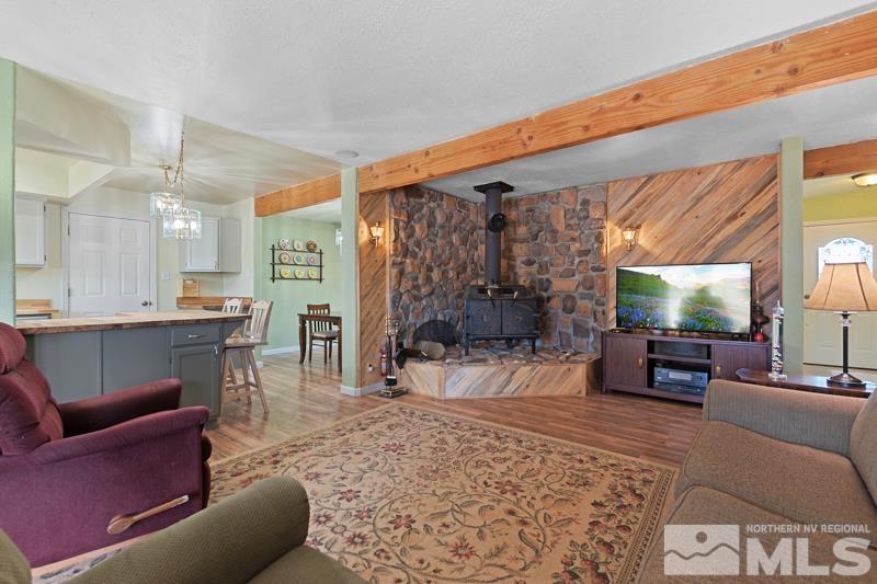 2920 Bullfrog Road Reno, NV 89521 - Photo 11 of 40 a living room with furniture and a flat screen tv