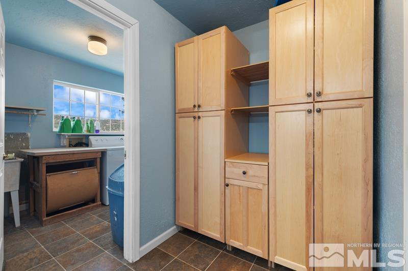 2920 Bullfrog Road Reno, NV 89521 - Photo 21 of 40 a kitchen with stainless steel appliances granite countertop a refrigerator and a sink