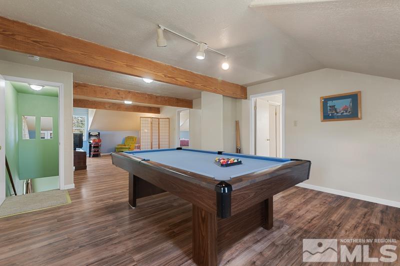 2920 Bullfrog Road Reno, NV 89521 - Photo 24 of 40 a room with furniture and wooden floor