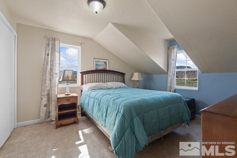 2920 Bullfrog Road Reno, NV 89521 - Photo 29 of 40 a bedroom with a bed and window