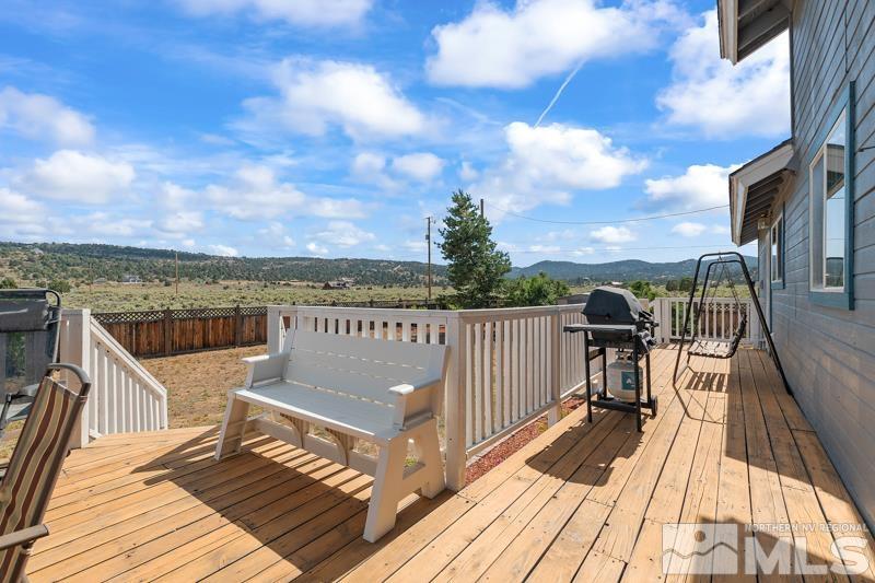 2920 Bullfrog Road Reno, NV 89521 - Photo 30 of 40 a view of balcony with wooden floor and city view